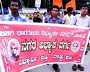 Hassan: ABVP Stages Protest Condemning Naxal Attack