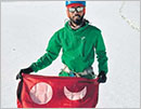 Mountaineer hoists Tulunadu flag at Himalayan mountains
