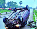 Car Turns Turtle on NH 66 at Baikampady; Driver Critical